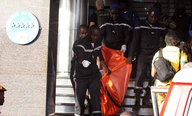 A body is removed from the Radisson Blu hotel, after it was stormed by gunmen during a attack on the hotel in Bamako. (Photo: AP) A body is removed from the Radisson Blu hotel, after it was stormed by gunmen during a attack on the hotel in Bamako. (Photo: AP)